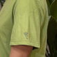 Nature's Embrace: Pista Green Short Tee
